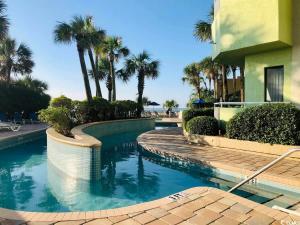 PH Corner Oceanfront at Coral Beach, Heated Pools!