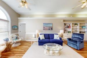 2nd-row modern home with beach access, trailer parking, deck, & outdoor shower