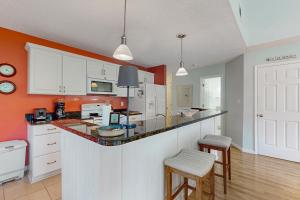 Updated golf resort condo near beach with pool, tennispickleball & private deck