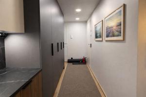 Modern Scandinavian Stay with Sauna & Glazed Balcony, near OYS & City Center