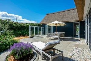 Thatched House At First Dune Row In Blokhus
