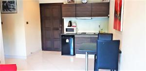 1-Bedroom Condo near Jomtien Beach with Lagoon Pool Resort Facilities