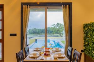 ELIVAAS Signature LakeMount 2-BHK Getaway with Private Pool, Open-Air Gazebo & Terrace At Fatehsagar Lake