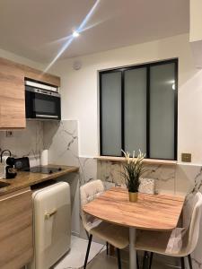 Studio Île Saint Louis 75004 Paris