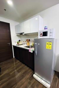 Air Residences 28F Balcony WiFi Netflix