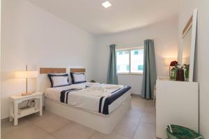 Blue Escape - Prainha, Alvor