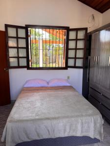 Casa aconchegante, 5min a pé da praia!