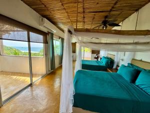 CASA CON AIRE ACONDICIONADO, PLAYA San Agustinillo Area