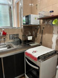 Aconchegante quarto e sala