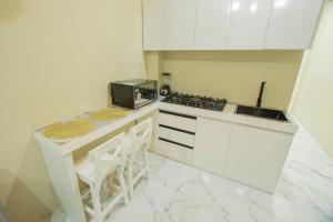 Apartamento para pareja 2 camas, cerca de la playa con lavadora y secadora