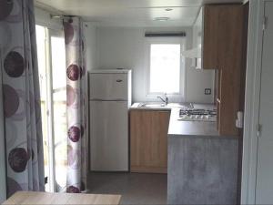 Mobil home confortable avec terrasse, 2 chambres - API-1-52-674