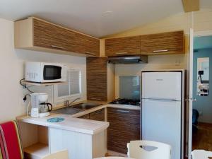 Mobil-home 32m² avec Terrasse, 3 Chambres pour 6 personnes - API-1-52-1245