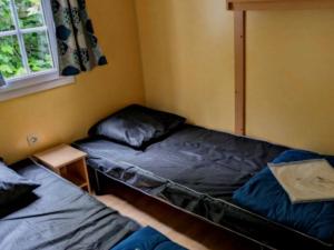 Mobil home 27m² avec terrasse, 2 chambres, 4 personnes - API-1-52-1249