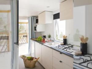 Mobil-home confortable - 2 Chambres, Terrasse, 4 pers. - API-1-52-1271