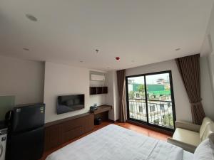 Luxe Paradise Suites Đội Cấn