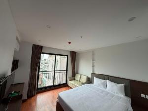 Luxe Paradise Suites Đội Cấn