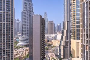 Free housekeeping visits during your stay - StayShort - Elegant 1BR Apartment in Downtown Ideal for 4