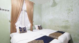 Hotel O Nayla Homestay Syariah Near Koro Koro Panam, Karaoke, Pool, & Cafe