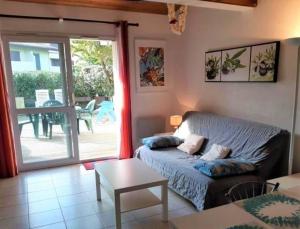 Réf 273 Seignosse Océan, Villa Patio classée 2 étoiles ,à 250m de la plage, avec place de parking et piscine commune , 4 personnes