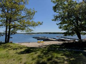 Lakefront Sand Bay Resort with Private Beach and BBQ