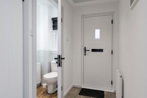 Stylish 3-Bed Home with Private Garden in Airdrie