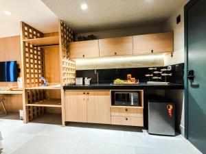 Studio Sofisticado Pé na Areia • Hidromassagem