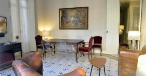 Historic 19th-Century Apartment with Balcony Overlooking Plaza