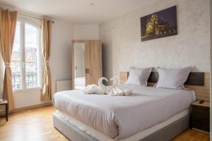 Cosy au pied du metro Paris a 10min