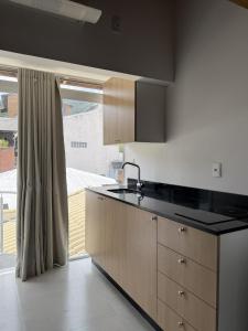 Studio moderno na Barra da Lagoa