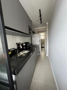 Flat em frente a praia da Guilhermina