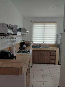 Sunset House Herradura