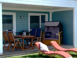 Maltes-Ostseekoje Parken frei vorm Haus, 500m zum Strand,Infrarotsauna,Magenta TV mit Netflix ,Disney TVund Rtl plus, Kaminofen im Wohnzimmer,ab Oktober Brennholz gratis Fahrradschuppen,Mückenschutz