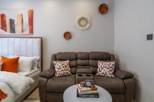 PJ Suites Studio Near SGR, JKIA, Expressway with Gym Pool Wi-Fi