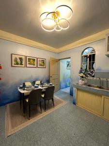 Carmela Haven Inn Baler