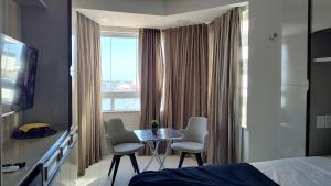 Golden suíte Frente Mar 1152