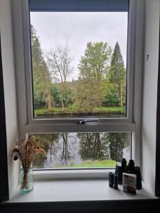 Modern apartment on the river in Callander
