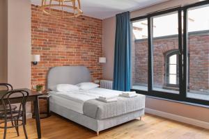 Maszynownia by Browar Hevelius Apartments