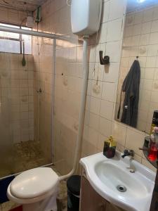 CASA COM 3 QUARTOS E 2 vagas