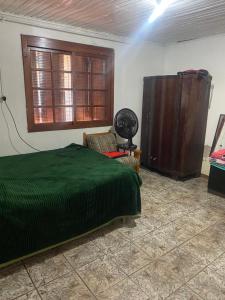 CASA COM 3 QUARTOS E 2 vagas