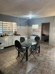 CASA COM 3 QUARTOS E 2 vagas