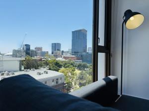 Spacious 2BR Apartment with Light Square Views & Parking