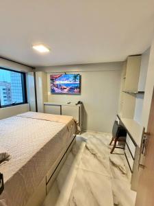 Estilo e Praticidade - Seu Flat ao lado do mar