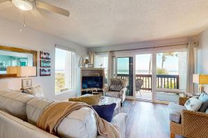 Oceanfront condo with resort amenities, beach access and pool