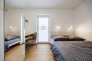 M2 Aura Apartments With Free Parking by StayNest