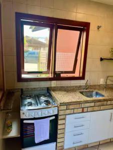 Recanto aconchego Campeche com Wi-fi, AC e garagem