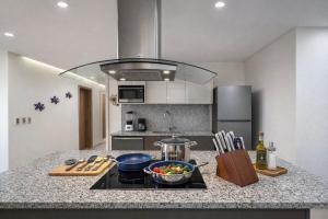 24k Propiedades Premium Condo on Malecon with Ocean View Sleeps 6