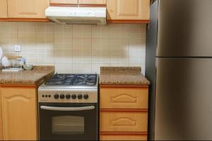 MONTHLY RENTAL 2BEDROOM VACATION HOME APARTMENT IN SHARJAH DUBAI BORDER BY MAUON TOURISM