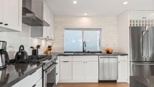 Steps to the Beach Modern 3BDR w Patio 257 Trailhead Trestles 1 by AvantStay