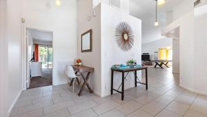 Luxury Oasis w Pool Hot Tub Fire Pit Games Big Yard Larrea by AvantStay