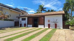 Casa em Riviera 80 metros da praia